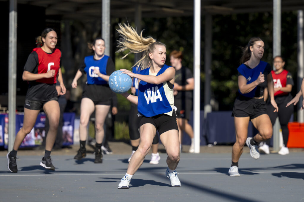 Corporate netball action photo Sydney